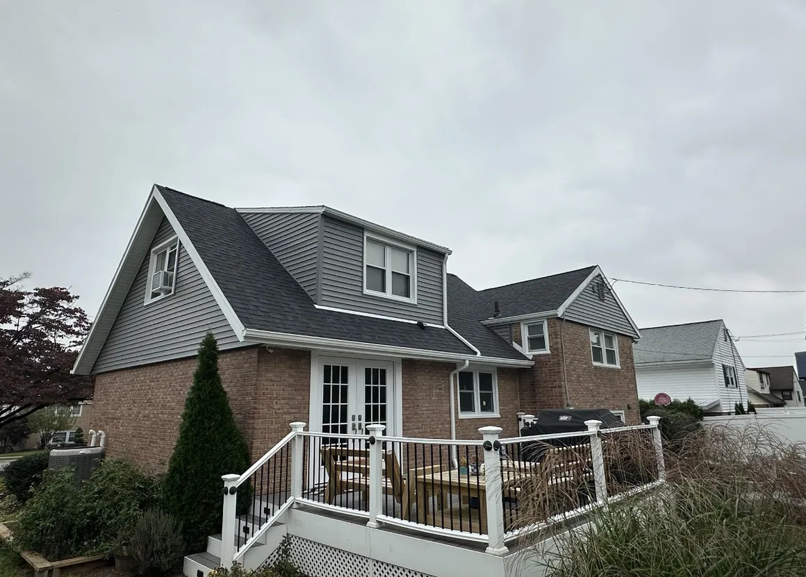 Dark roof and horizontal vinyl siding
